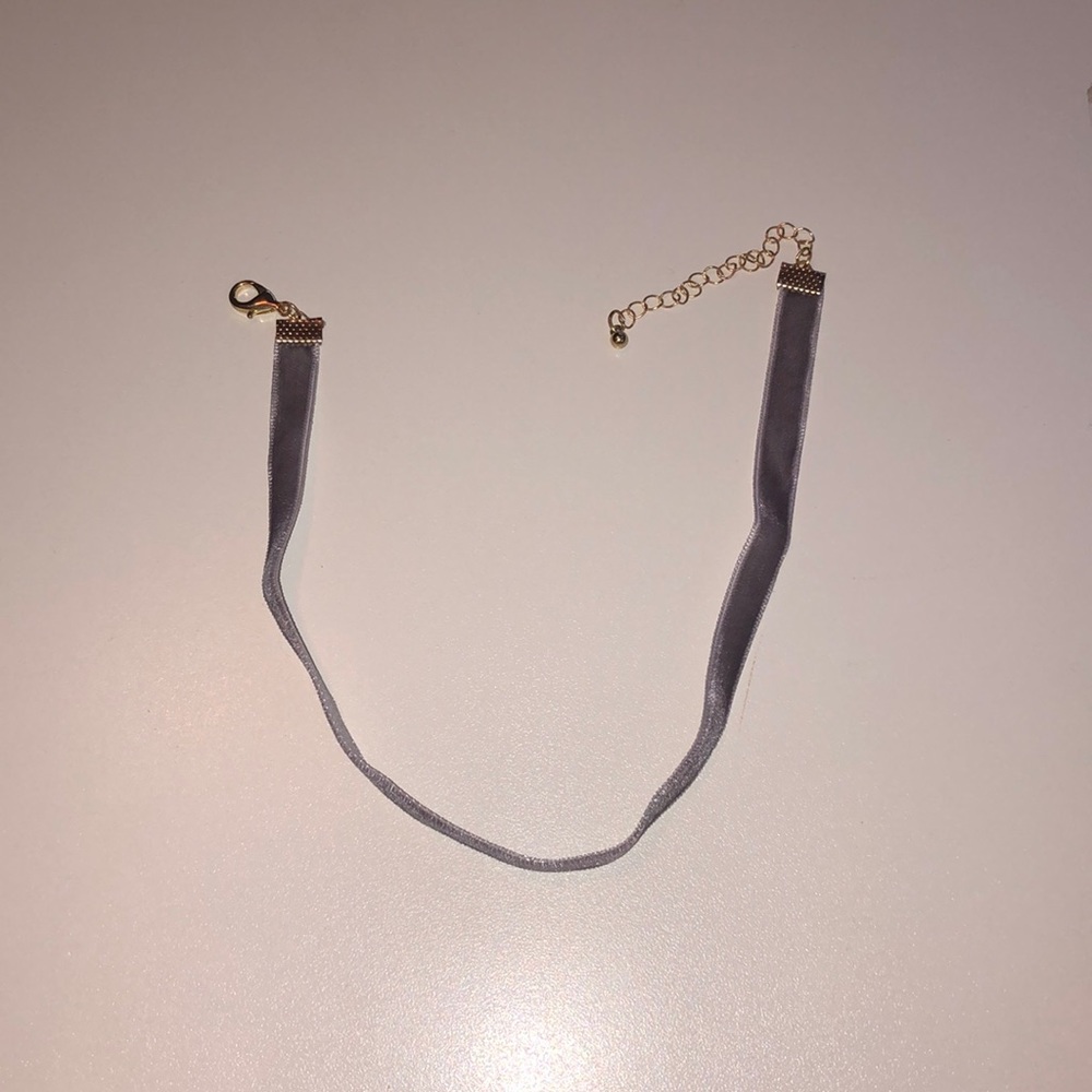 This is a grey velvet choker